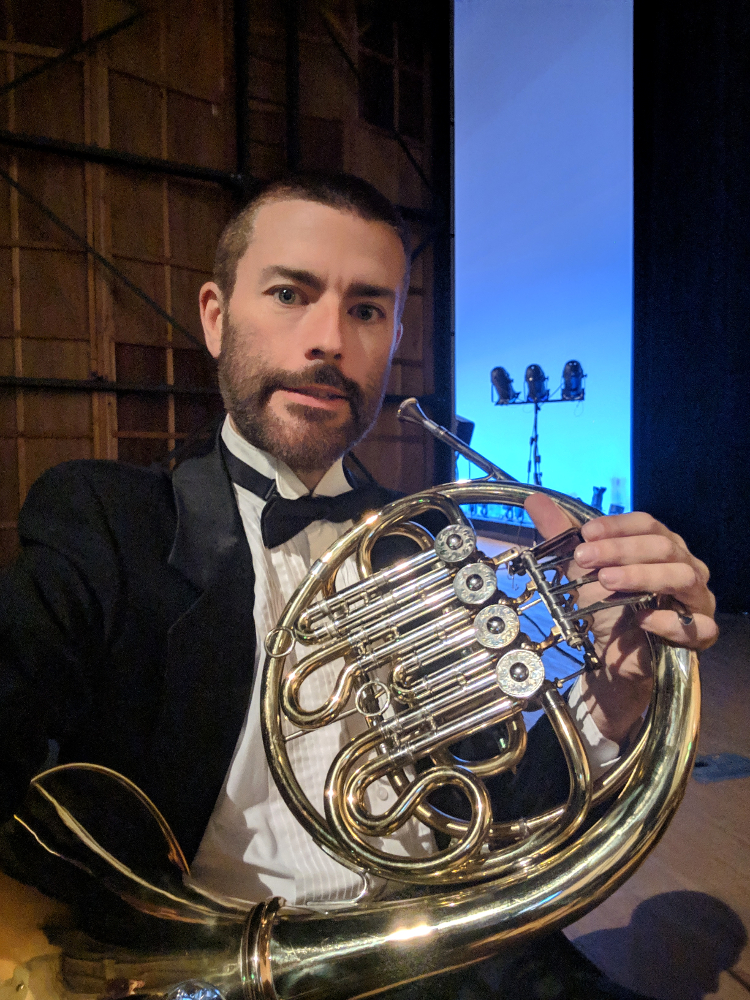 Dann prepares backstage for performance in Japan